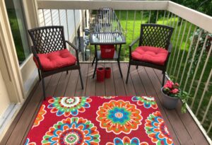 deck with chairs, lights, rug