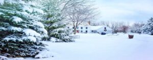 snow covered home in the country